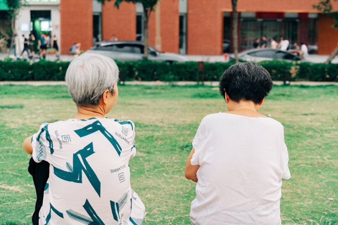 elderly people exercising outdoors