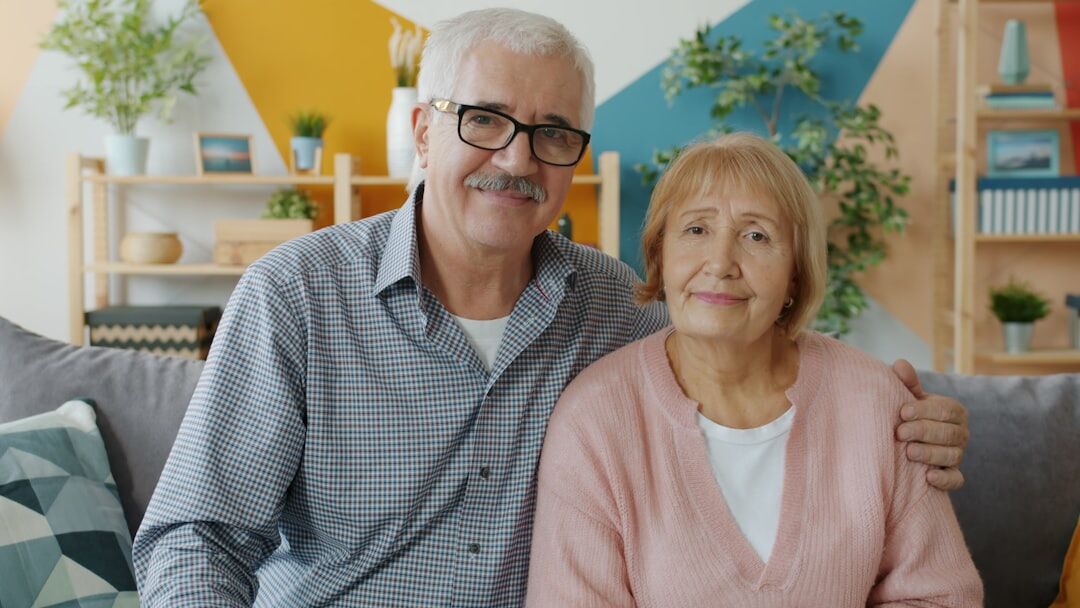 happy elderly couple smiling