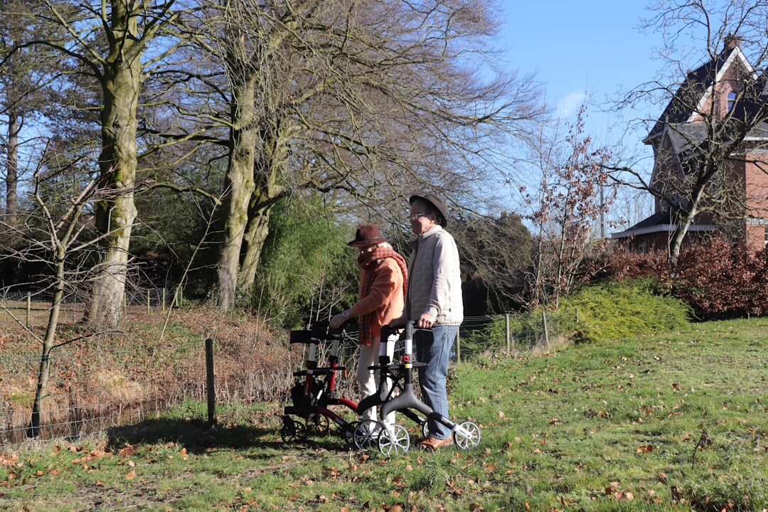 senior couple walking in park