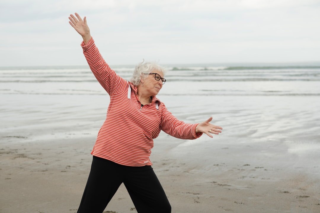 older woman doing yoga